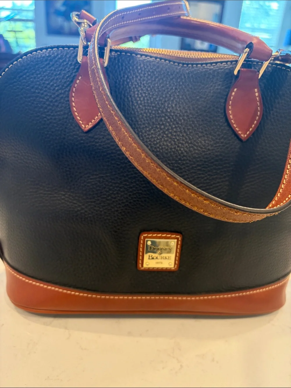 Dooney & Bourke Black with Brown Trim Pebbled Leather Dome Satchel